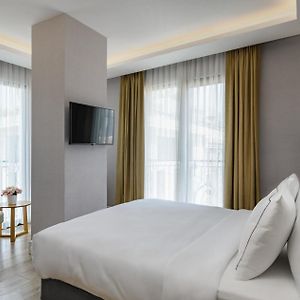 Kamer met een King Size Bed op de Hoek